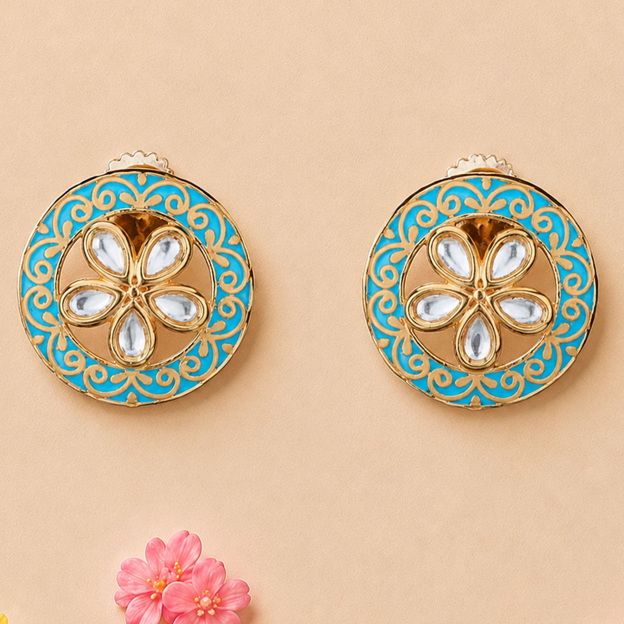 Turquoise and gold enamel floral kundan stud earrings with clear stones in golden tone for bridal and festive wear