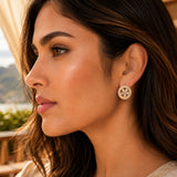 Gold-toned indian kundan stud earring with delicate floral design and sparkling embellishments for women bridal wear