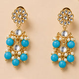 Gold tone Indian floral kundan stone earrings with clear stones, turquoise beads, and faux pearls for wedding wear