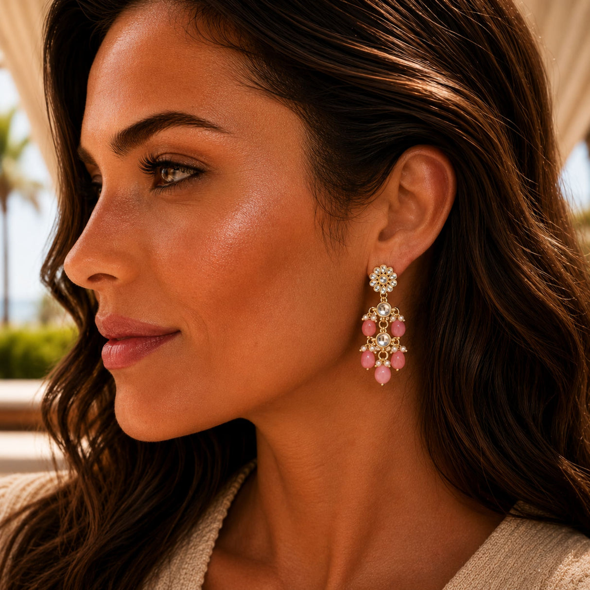 Elegant gold tone Indian floral kundan stone chandelier earring with pink beads and clear crystals for ethnic wear
