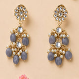 Gold tone Indian floral kundan stone earrings with gray oval beads and faux pearls for Diwali wedding wear
