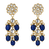 Elegant gold tone Indian floral kundan stone earrings with deep blue beads and faux pearls for Diwali and wedding wear