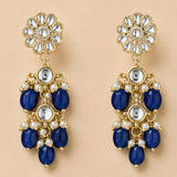 Elegant gold tone Indian floral kundan stone earrings with deep blue beads and white pearls for Diwali and weddings