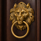 Large lion head brass door knocker with intricate gold finish mane and polished ring for home decor and housewarming gift
