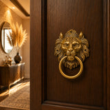 Large golden lion head brass door knocker with intricate mane and ring for vintage home decor and housewarming gift