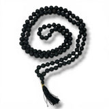 Black lava rock mala necklace with 8mm beads gold toned clasp and black tassel for meditation and spiritual use