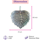 Silver aluminum leaf-shaped incense stick holder with detailed veining and textured surface for pooja and meditation room