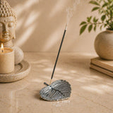 Silver leaf-shaped incense holder with intricate etched detailing for pooja and living room decor