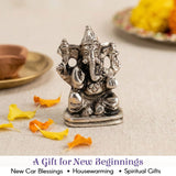 Silver Ganesha metal car dashboard idol with elephant head and multiple arms