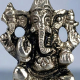Silver intricately detailed metal Lord Ganesha figurine with elephant head