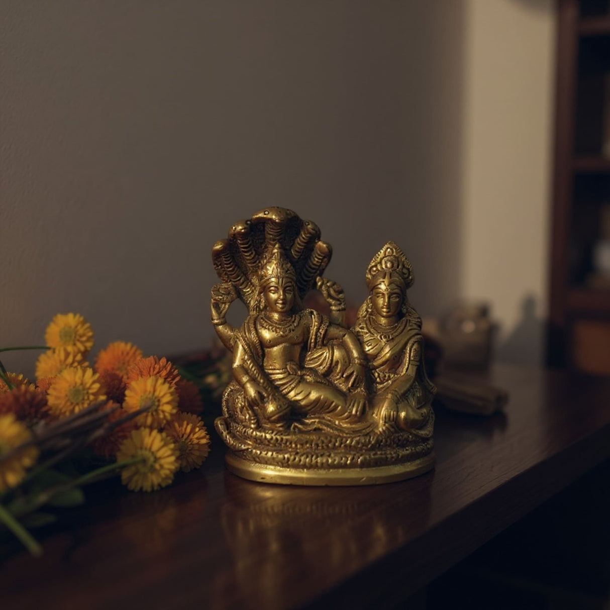 Golden brass statue of Lord Vishnu and Lakshmi Ji on Shesha Naag pedestal for Mandir and Puja