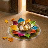 Lotus brass diya with vibrant rainbow-painted metal petals and golden bowl for traditional Hindu pooja and Diwali decor