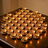 Golden lotus brass finish diya oil lamps with intricate flame patterns and small handles for home pooja and Diwali decor