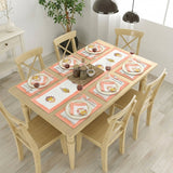 Set of six coral-bordered cotton placemats with embroidered autumn leaf designs for dining table decoration
