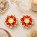 Two red and gold lotus tealight candle holders with crystal accents for Diwali pooja and home decor