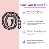 Black beaded LOVENSPIRE 108 mala necklace with tassel made of natural healing crystal gemstones for meditation and yoga