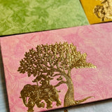 Pink textured money envelope with gold-leafed elephant and tree design for Indian wedding and cash gifting