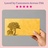 Golden embossed money envelope with detailed elephant and tree design for indian wedding shagun and cash gifts