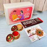 Decorative flower-shaped red and gold metal haldi kumkum holder with vermilion powder in designer mandala seed rakhi gift hamper