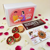 Pink and white gift box labeled happy raksha bandhan by lovenspire for designer mandala seed rakhi hamper