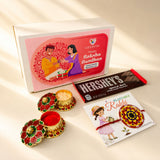 A vibrant red and gold floral patterned designer mandala seed rakhi bracelet with an intricate circular design for brother