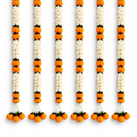 Artificial jasmine and marigold flower garlands in orange white with green accents for wedding and festive decor