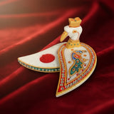 White peacock-shaped marble decorative box with gold accents and red gemstones for Pooja and Diwali decor