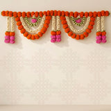 Vibrant orange and pink marigold jasmine door toran garland with white bead accents for traditional indian and festive decor