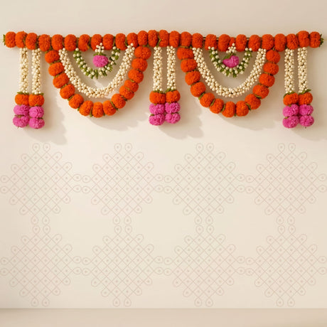 Vibrant orange and pink marigold jasmine door toran garland with white bead accents for traditional indian and festive decor
