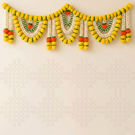 A vibrant yellow white and green artificial marigold jasmine garland with decorative pom-poms for festival pooja decor