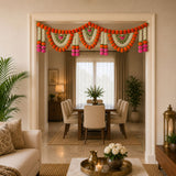 A vibrant orange white and pink artificial marigold jasmine garland with green leaves for Indian festival pooja decor