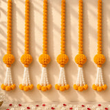 Artificial marigold and jasmine hanging jhoomer garland with vibrant orange flowers and white beaded tassels for decorative use