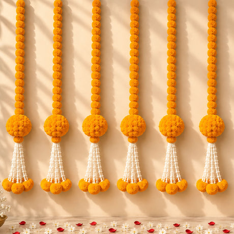 Artificial marigold and jasmine hanging jhoomer garland with vibrant orange flowers and white beaded tassels for decorative use