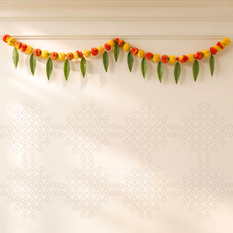 A 5 feet marigold mango leaf door toran hanging valance with vibrant red yellow flowers and green leaves for festival decor