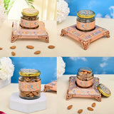 Almond-filled glass jars on decorative stands for dry fruits and treats storage