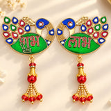 Golden meenakari peacock-shaped door decoration with green enamel body, red blue gemstone eyes, and red bead tassels for diwali gift