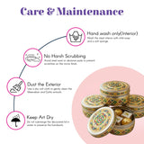 Meenakari stainless steel round cookie tin with hand-painted meenakari and gotta artwork and gold-trimmed lid