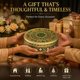 A round ornate stainless steel tortilla warmer with lid featuring intricate gold green blue and red meenakari design