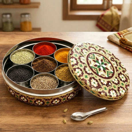 Ornate maroon gold Meenakari steel masala box with 7 spice compartments