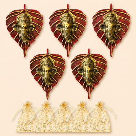 Metal leaf ganesha wall hanging decor featuring red glittery leaves and golden intricate ganesha faces for home and office