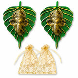 Green leaf shaped metal wall decor featuring golden intricate ganesha heads for home living room diwali decorations