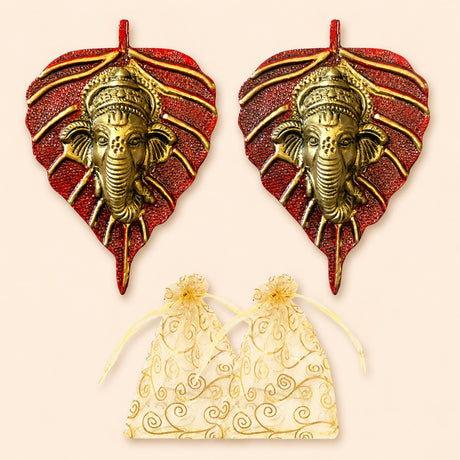 Metal leaf ganesha wall hanging decor in red and gold featuring intricate ganesha carvings for home and office