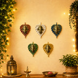 Set of five metallic leaf shaped ganesha wall decor pieces in red, white, blue, green, and gold for home and office decoration