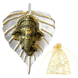 Metal leaf ganesha wall hanging decor with golden ganesha head mounted on a silver leaf plaque for home and office