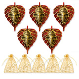 Metal leaf ganesha wall hanging decor featuring red and gold leaf-shaped metal ornaments with detailed ganesha faces