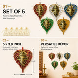 Set of five assorted leaf-shaped metal ganesha wall hangings in red silver blue green and gold with embossed detailing for decor