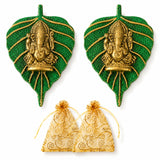 Two pcs green metal leaf wall hangings with golden ganesha figures and gold embossed veining for diwali decor