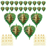 Green metal leaf-shaped wall hanging decor featuring golden ganesha head design for home living room and office use