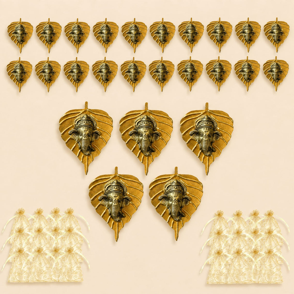 Golden metal leaf-shaped wall hanging decor with intricate ganesha head carvings for home living room and office use
