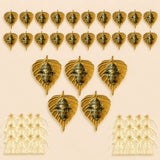 Golden metal leaf-shaped wall hanging decor with intricate ganesha head carvings for home living room and office use